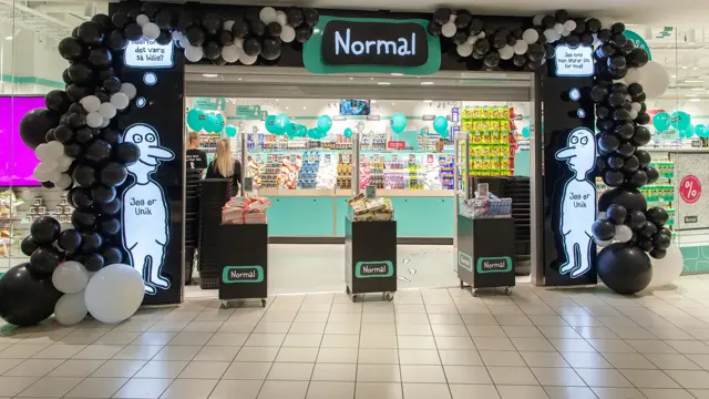 Butikkfasade med ballongbue normal