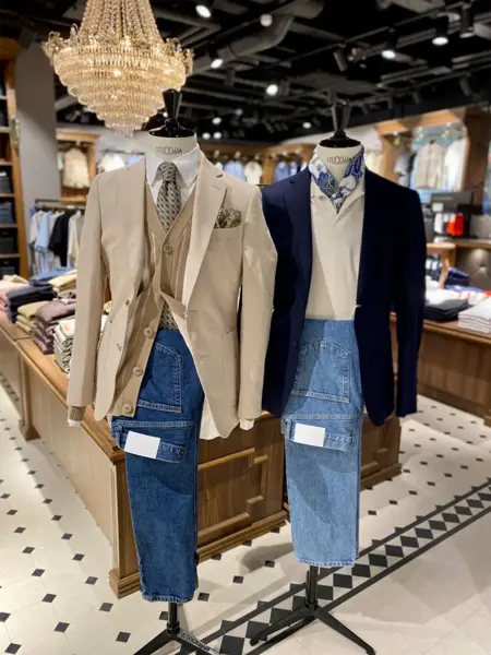 Utkledningsdukker kledd i dressjakker og jeans