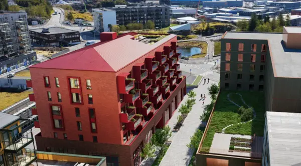 Hotell og leilighetsbygg vest for Sartor
