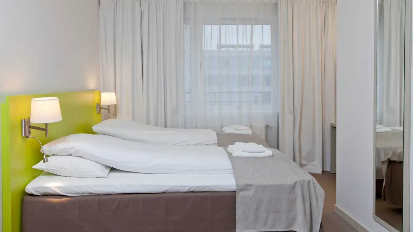 Senger i twin rom på Thon Hotel Munch i Oslo