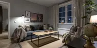 Bilde av stue med sofa og lenestol fra Skitorget på Skeikampen