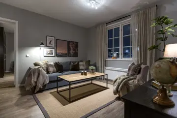 Bilde av stue med sofa og lenestol fra Skitorget på Skeikampen