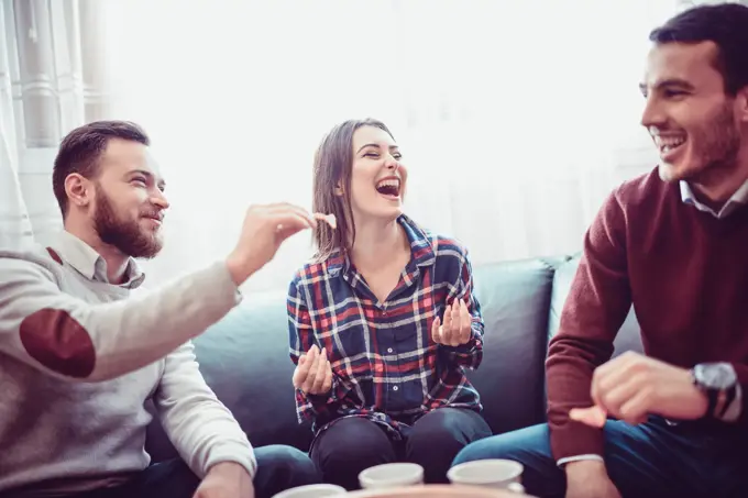 Group of Friend Eating Snacks, Conversing and Having Fun Time Together