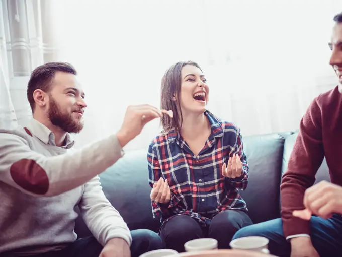 Group of Friend Eating Snacks, Conversing and Having Fun Time Together