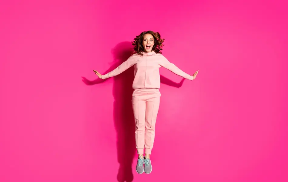 Full length body size photo jump high amazing she her lady hands arms flirty raised cute sweet wearing casual pink costume suit pullover outfit isolated vibrant rose background