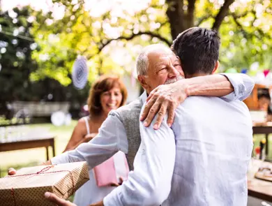 Family celebration outside in the backyard. Big garden party. Birthday celebration.