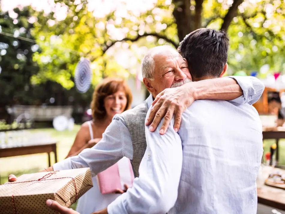 Family celebration outside in the backyard. Big garden party. Birthday celebration.