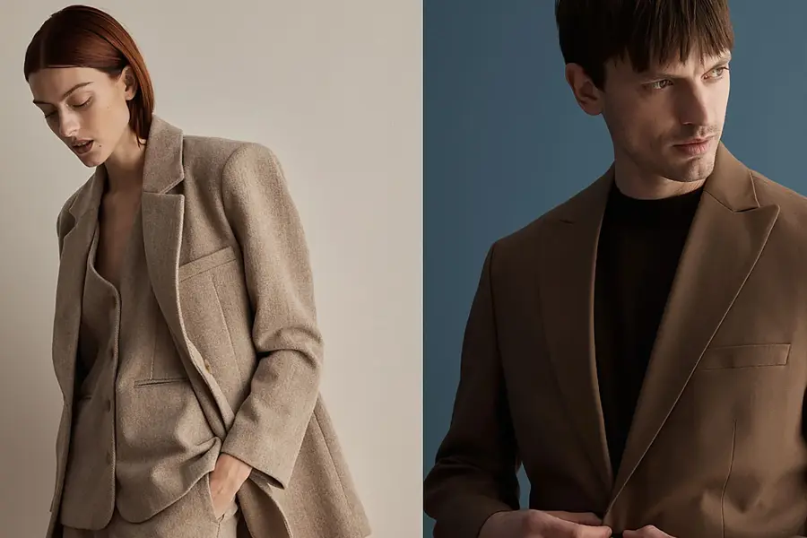 Man går med jakke på gata 