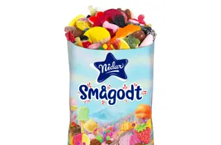 En pose fylt med smågodt fra Nidar.
