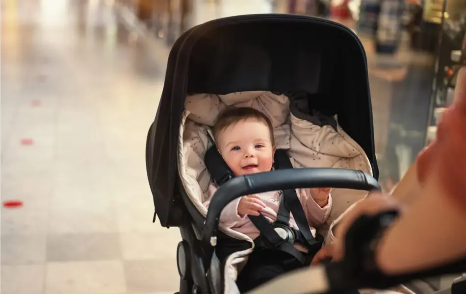 Baby i en trillevogn