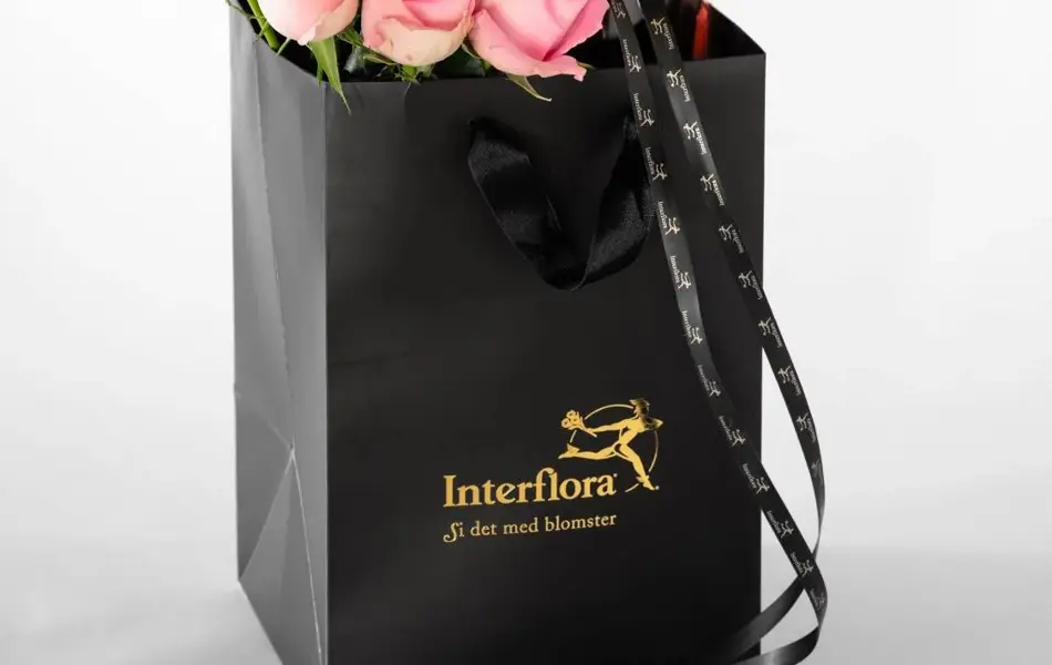 Roser i gavepose med Cider