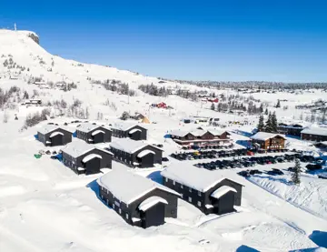 Oversiktsbildet av Skeikampen og boligprosjektet Skitorget.