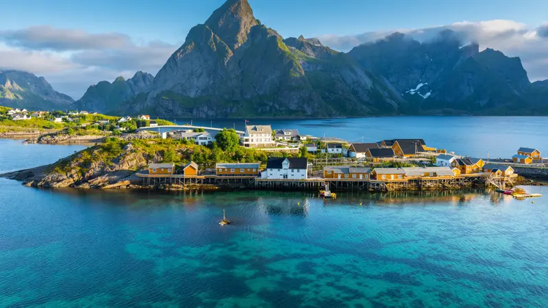 Lofoten is an archipelago in the county of Nordland, Norway. Is known for a distinctive scenery with dramatic mountains and peaks, open sea and sheltered bays, beaches and untouched lands.