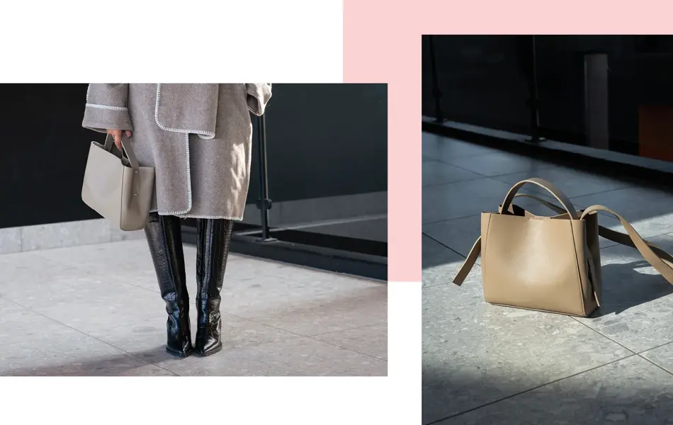 Dame viser frem vesker