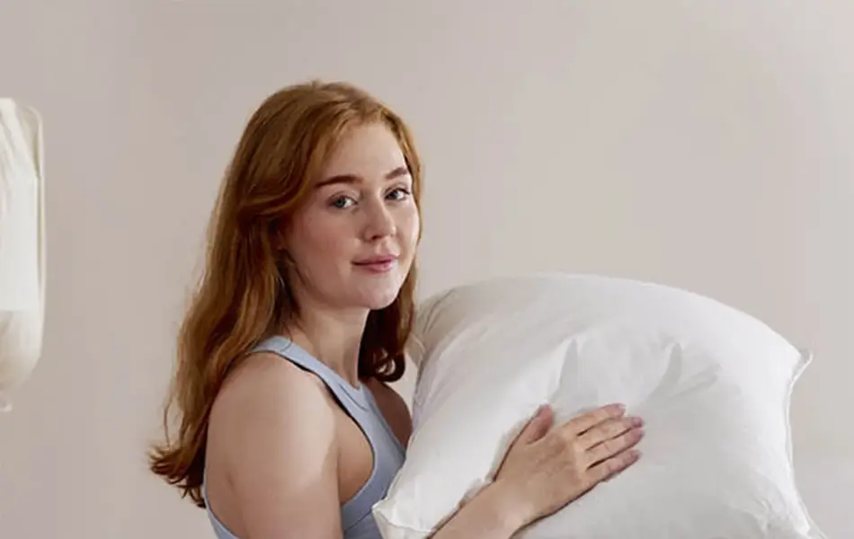 Dame med pute og dyne