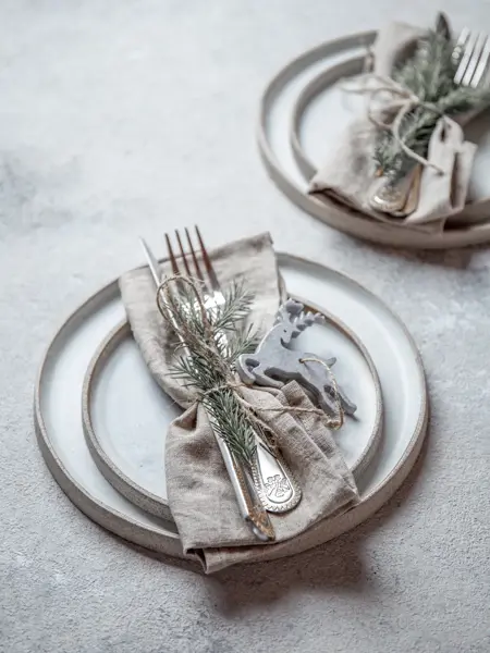 Cristmas table cutlery set with holiday decoration. Top view, copy space.