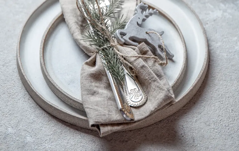 Cristmas table cutlery set with holiday decoration. Top view, copy space.