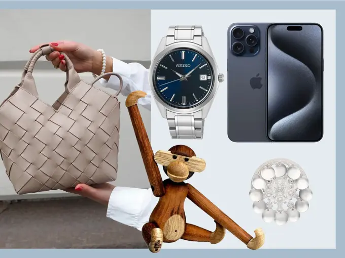 Hender holder en skinnveske, klokke, iPhone, Kai Bojesen ape, bunadsølje