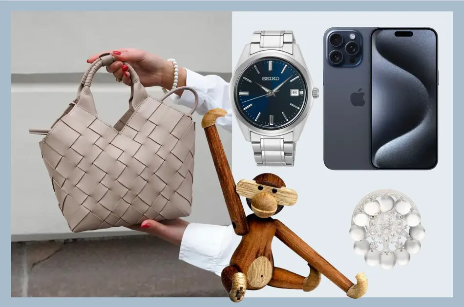 Hender holder en skinnveske, klokke, iPhone, Kai Bojesen ape, bunadsølje