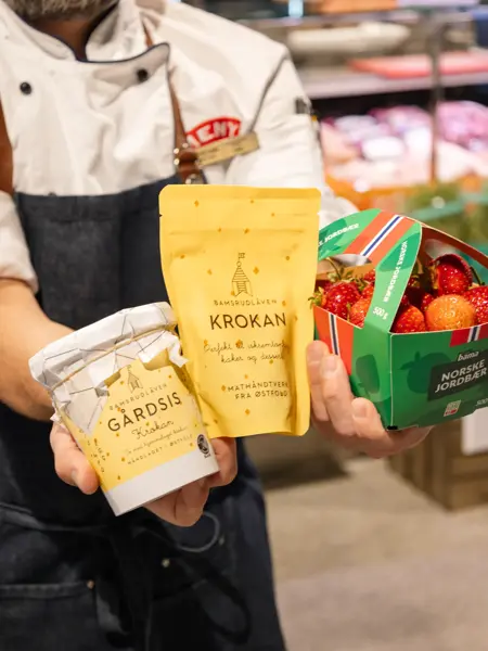 mann holder matvarer