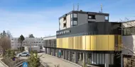 Thon Senter Østerås, fasade med logo.