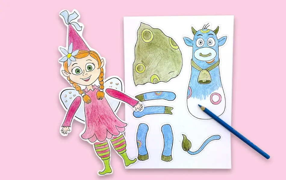 amelia og oskar-papirdukker på rosa bord