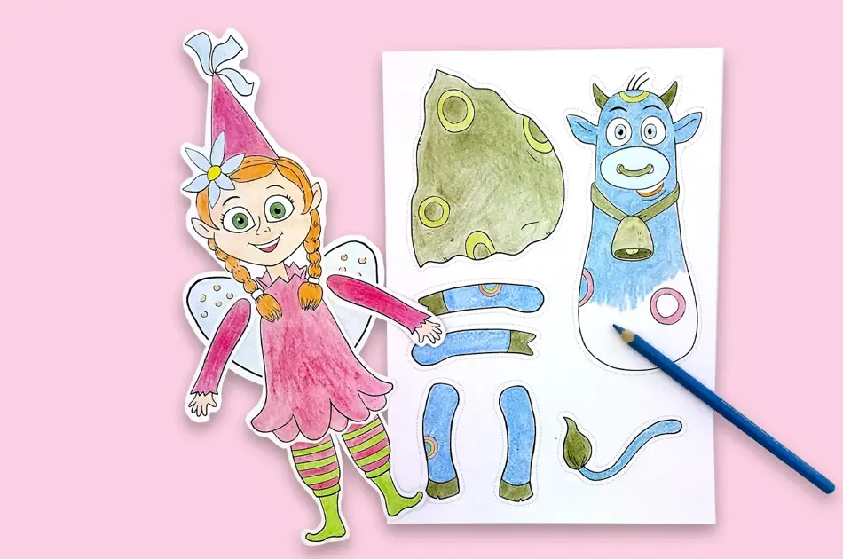 amelia og oskar-papirdukker på rosa bord