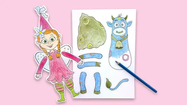 amelia og oskar-papirdukker på rosa bord