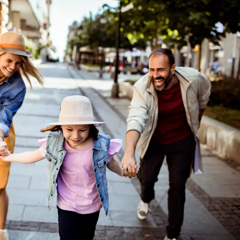 Close up of a Young family shopping in the city