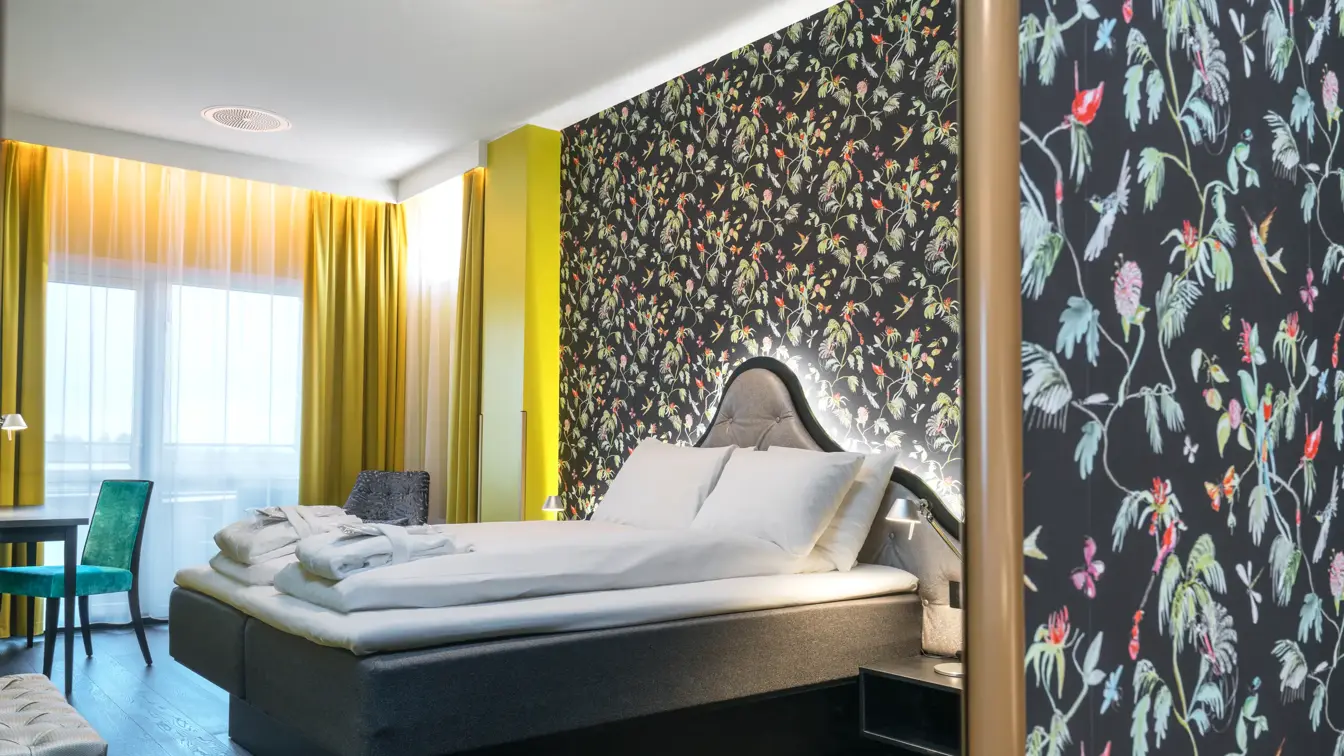 Dobbeltseng i suite på Thon Hotel Bergen Airport