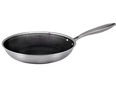 Stekepanne med mønstret stekeflate i rustfritt stål.