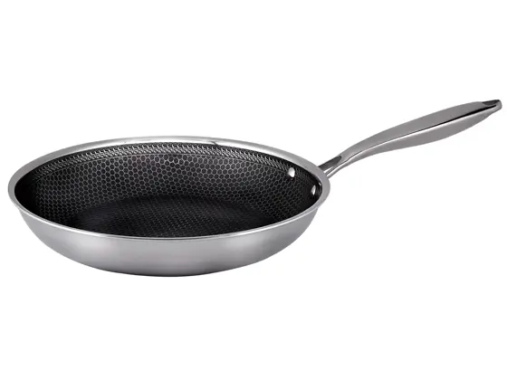 Stekepanne med mønstret stekeflate i rustfritt stål.