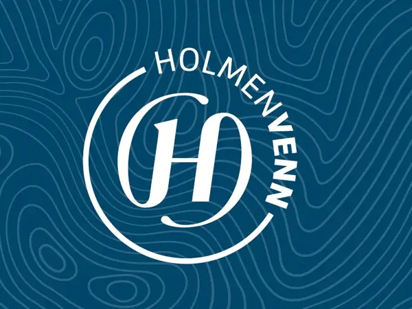 Logoen til Holmenvenn med blå bakgrunn
