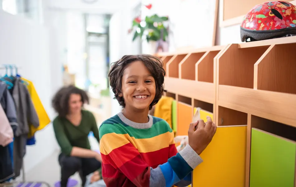 Children in cloakroom getting ready.