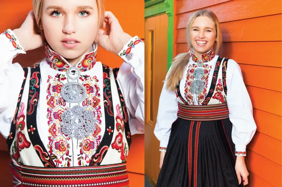 Jente i rød og svart bunad