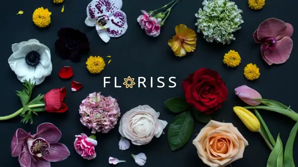 Mange forskjellige blomster som ligger utover rundt logoen til Floriss