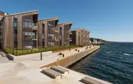 Bildet viser fasaden på boligprosjektet Lehmanns Brygge i Drøbak.