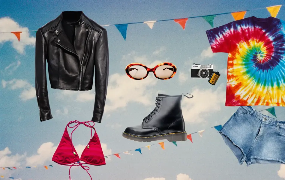 Sky background with colorful flag bunting to celebrate an event. Colorful flags in rainbow colors hanging across the blue sky with clouds. Conceptual image for happiness, hope, and summer celebration, or sale promotion.