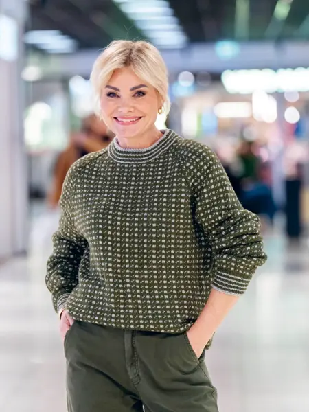 Peronal shopper Marianne Stene med grønn islender